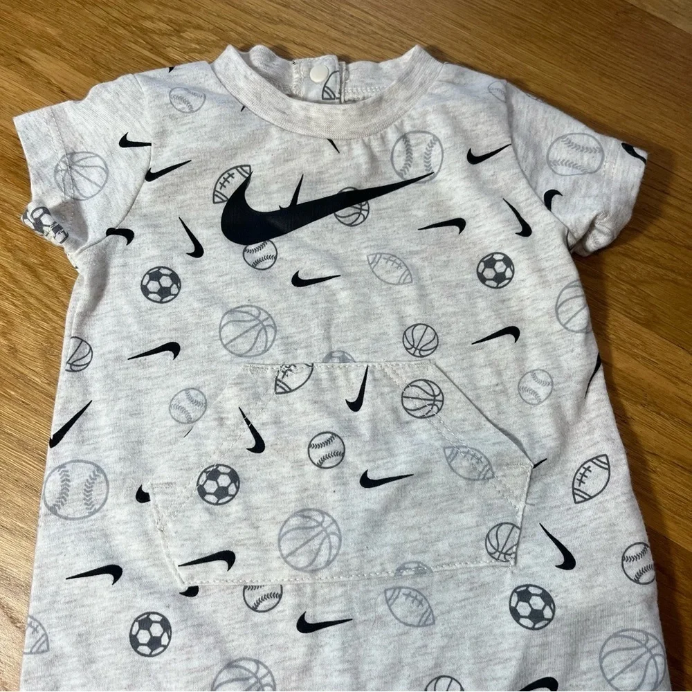 Nike Cream and Black Bodysuit with Short Sleeves and Sports Print